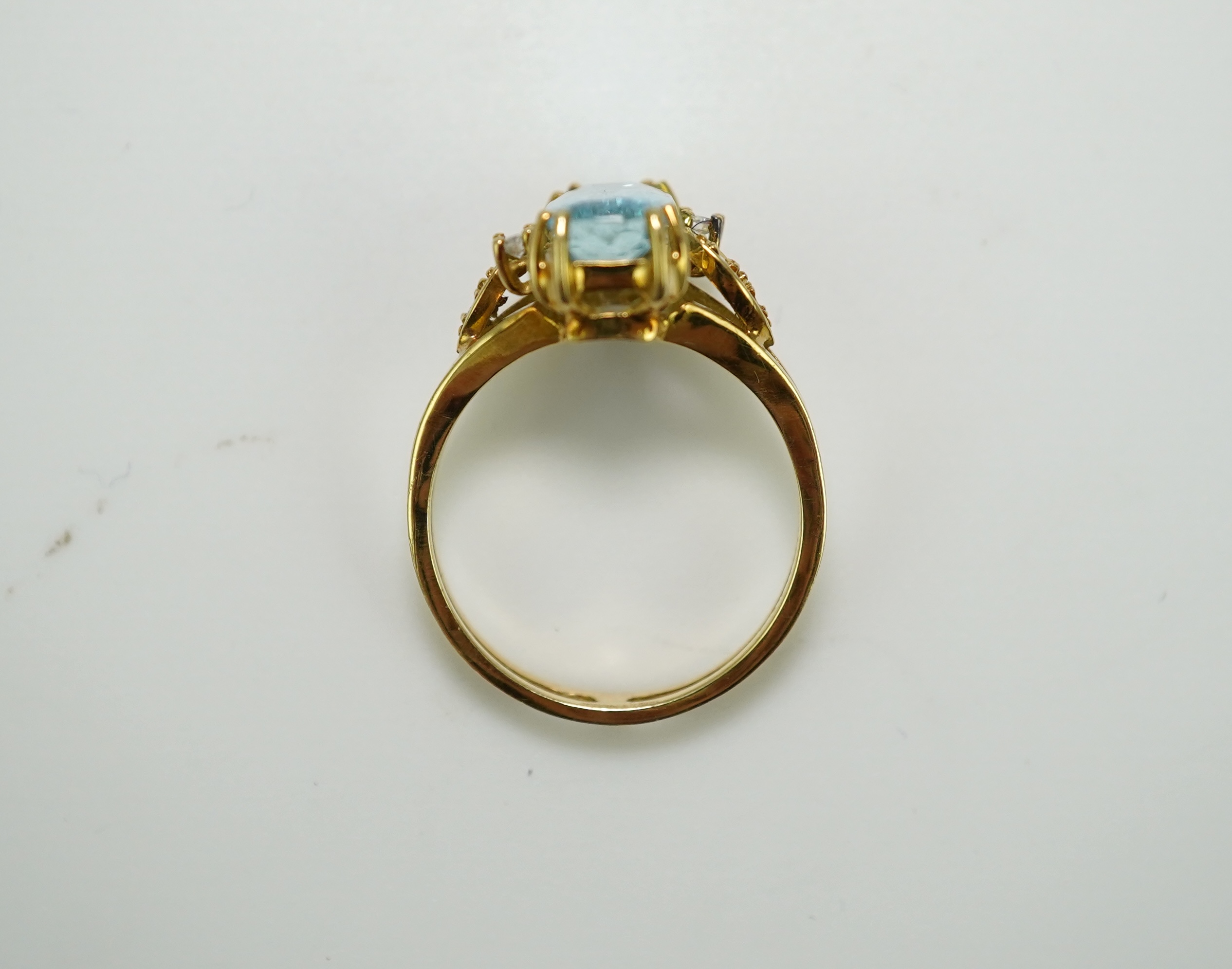 An aquamarine and diamond ring